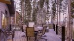 Outdoor patio with forested views